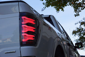 AlphaRex LUXX - Series LED Tail Lights (Black - Red) | Ford F150 (2021 - 2023) - Truck Brigade