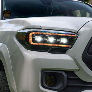 White Toyota Tacoma side end view with Form Lights Sequential LED Projector Headlights (Amber DRL) for Toyota Tacoma