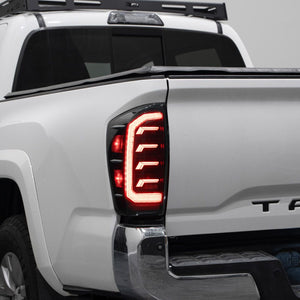 Form Lights LED Tail Lights on a sideview white Toyota Tacoma truck,