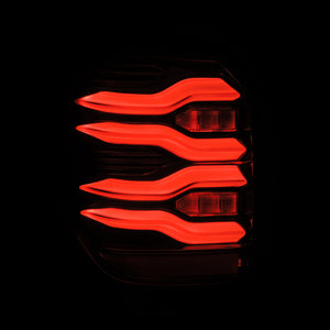 AlphaRex LUXX-Series LED Tail Lights (Red) for Toyota 4Runner in a red light