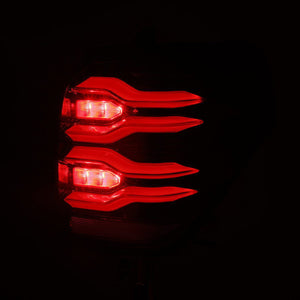 AlphaRex LUXX-Series LED Tail Lights (Alpha-Black) for Toyota 4Runner in a red light