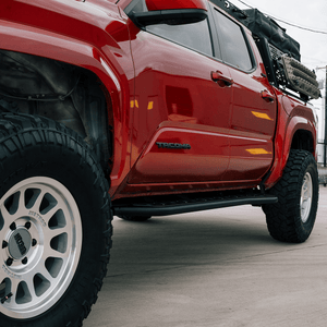 Cali Raised Step Edition Bolt-On Rock Sliders | Toyota Tacoma (2024) | Truck Brigade