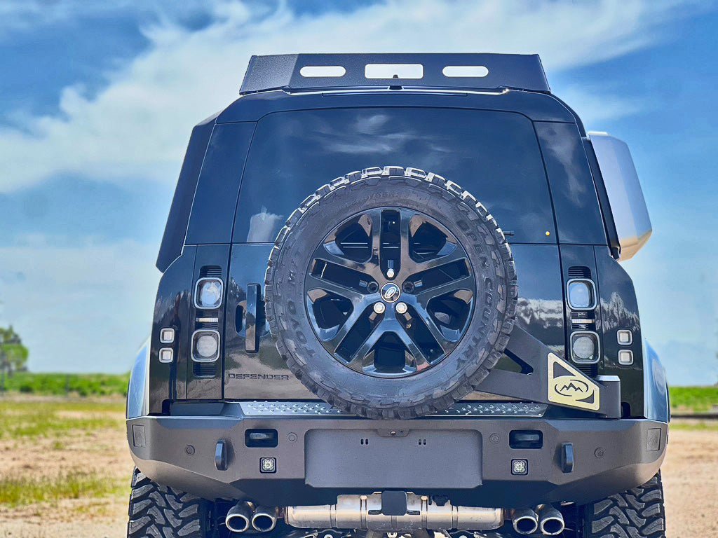 Expedition One Smooth Motion Tire Carrier Rear Bumper System | Land Rover Defender (2020 - 2026) | Truck Brigade