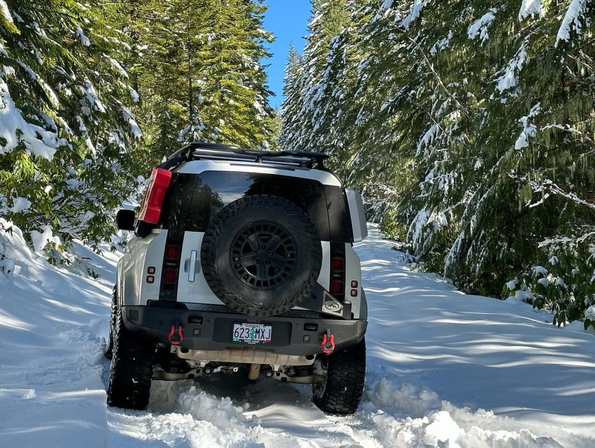 Expedition One Smooth Motion Tire Carrier Rear Bumper System | Land Rover Defender (2020 - 2026) | Truck Brigade