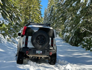 Expedition One Smooth Motion Tire Carrier Rear Bumper System | Land Rover Defender (2020 - 2026) | Truck Brigade