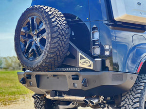 Expedition One Smooth Motion Tire Carrier Rear Bumper System | Land Rover Defender (2020 - 2026) | Truck Brigade